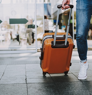 Person with suitcase in airport